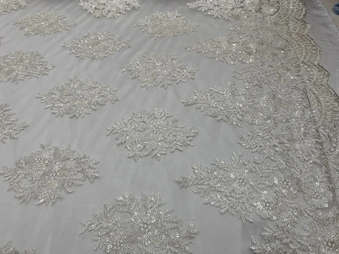 Corded flowers white lace fabric