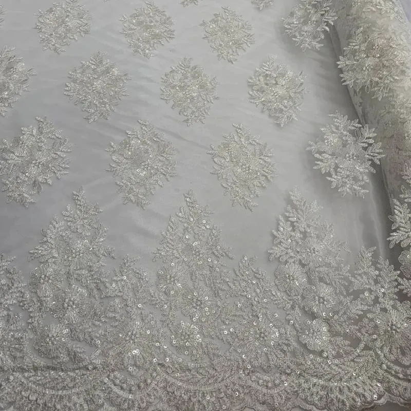 Corded flowers white lace fabric